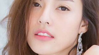 Thai girl recording her own sex video and enjoying it.